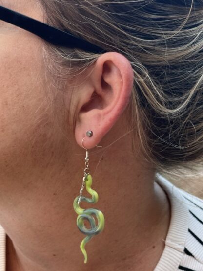 dual green snake swirl earring