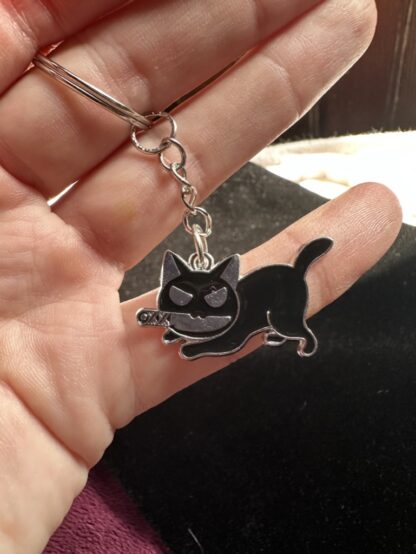 Knife attack kitty keychain